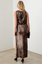 Load image into Gallery viewer, Tasha Apparel Metallic Shiny Sequins Back Ribbon Bubble Top
